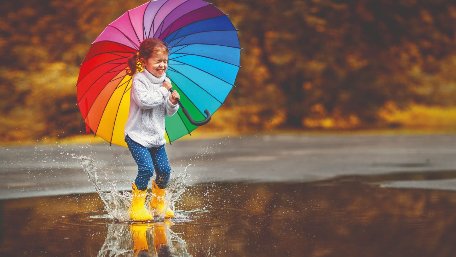 Child jumping in puddles – WWT’s nation-wide puddle jumping championships 